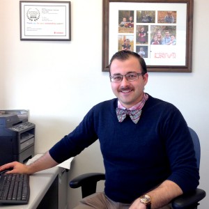 headshot of Justin MacLennan in office