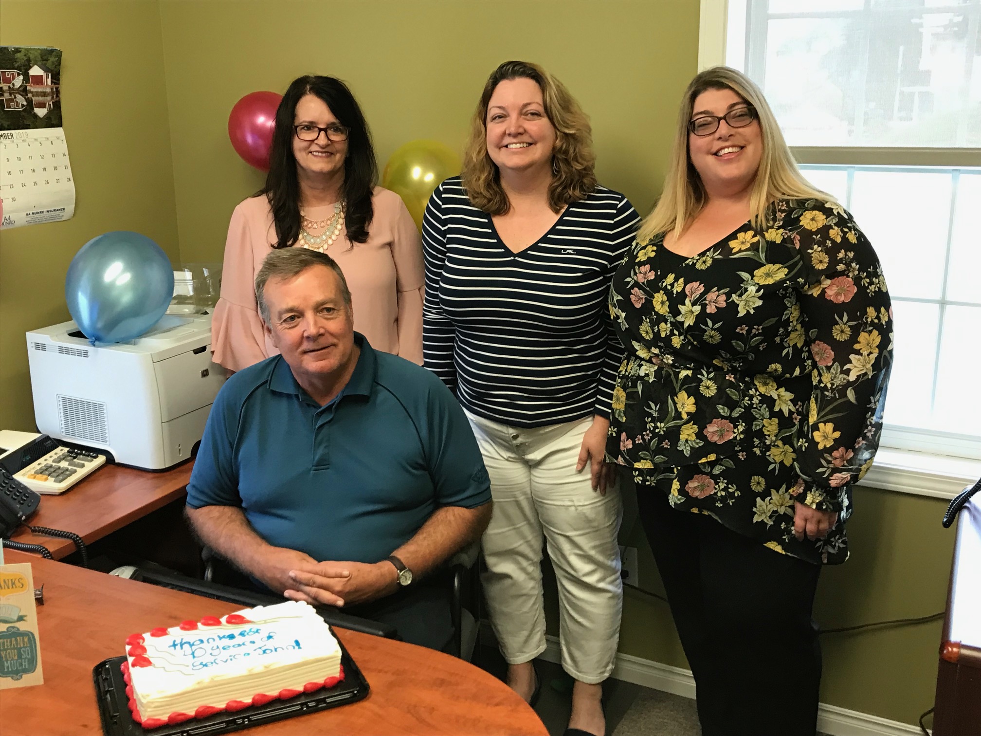 John Munro being celebrated for 45 years of service with coworkers